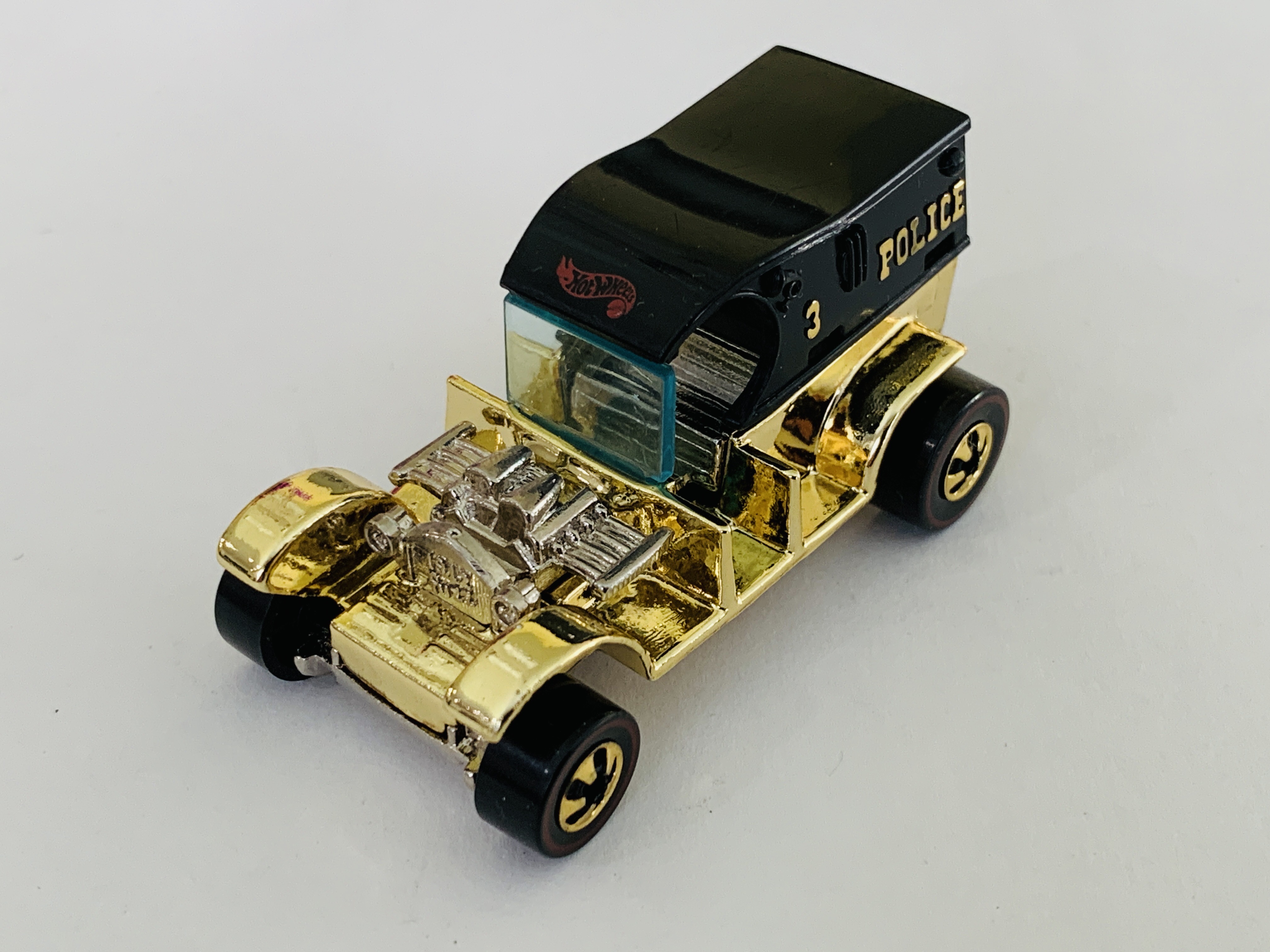 Hot Wheels FAO Schwarz Gold Series Paddy Wagon